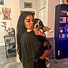 Diesel is registered to the contest to win money with this photo: affection, black_hair, bookshelf, cabinet, cart, cozy, cute, dog, door, floor_tile, glassware, holding, home, indoor, long_hair, person, portrait, puppy, tattoo, wall_art