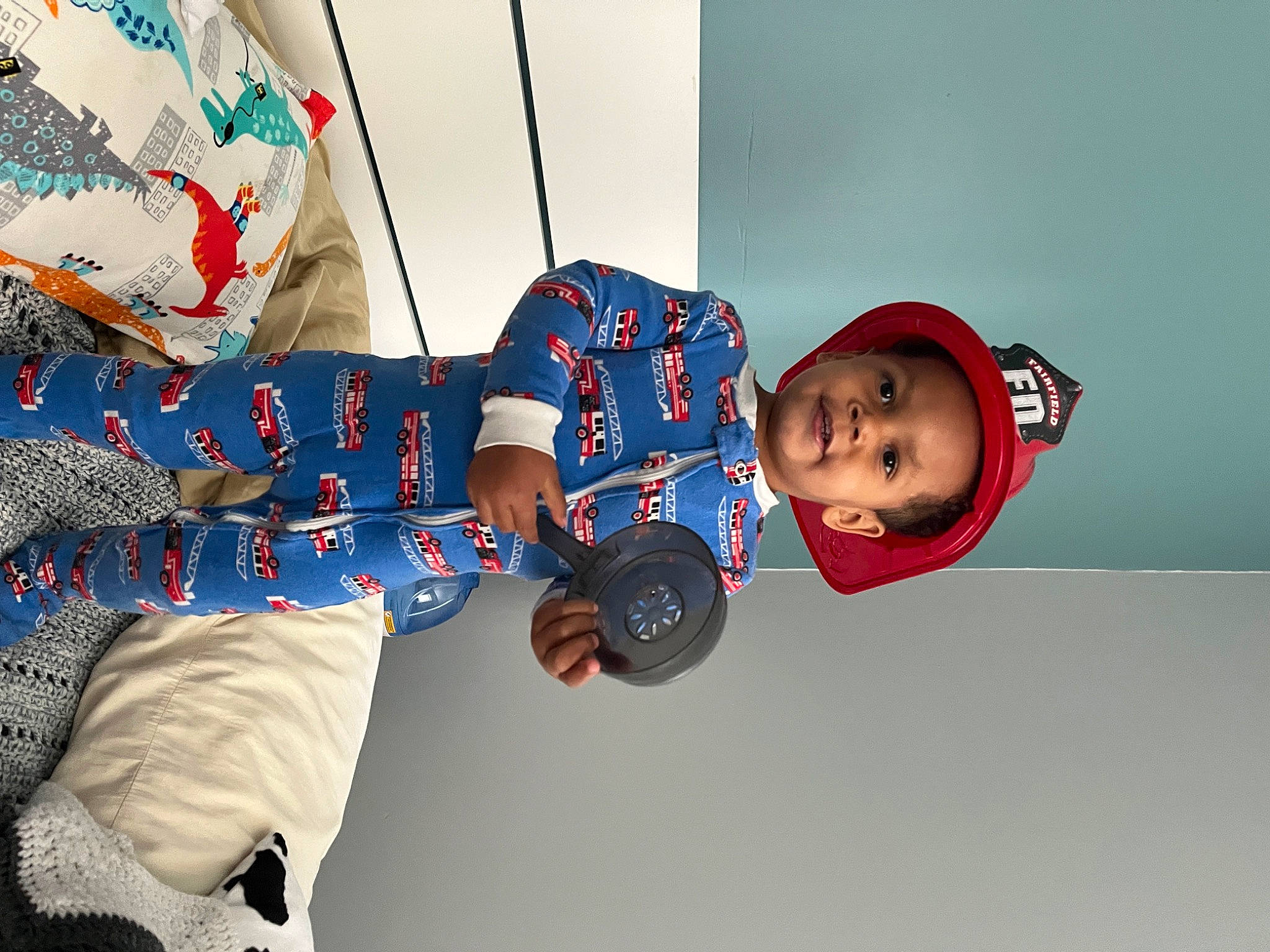 Emerson is registered to the contest to win money with this photo: baby, baby_toddler_clothing, carmine, child, denim, elbow, electric_blue, fun, happy, headgear, joy, pattern, person, play, sitting, sleeve, toddler, winter