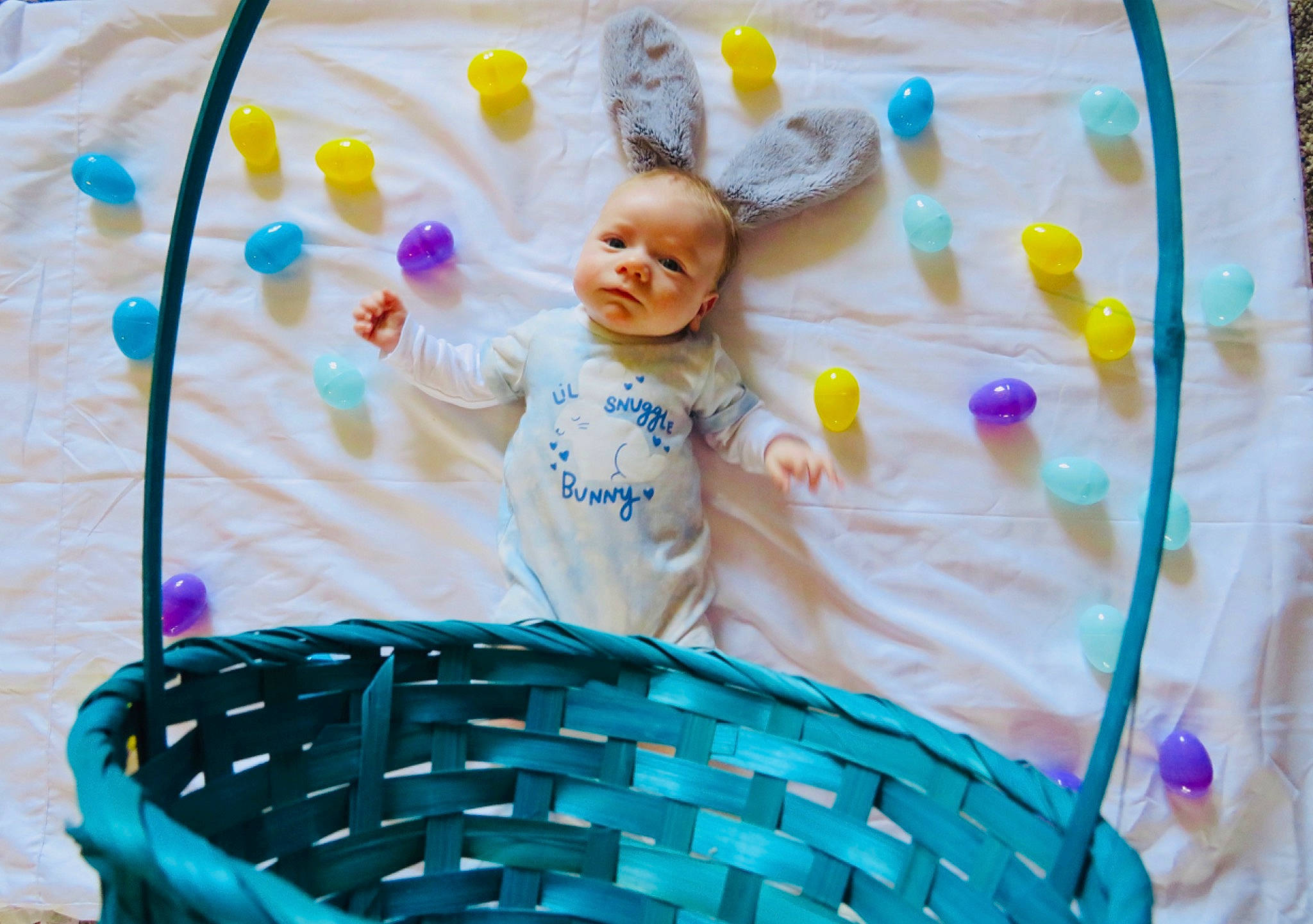 Hudson is registered to the contest to win money with this photo: baby, baby_products, baby_toddler_clothing, birthday, child, circle, electric_blue, event, fun, happy, leisure, linens, party_supply, pattern, person, pink, play, product, t_shirt, textile