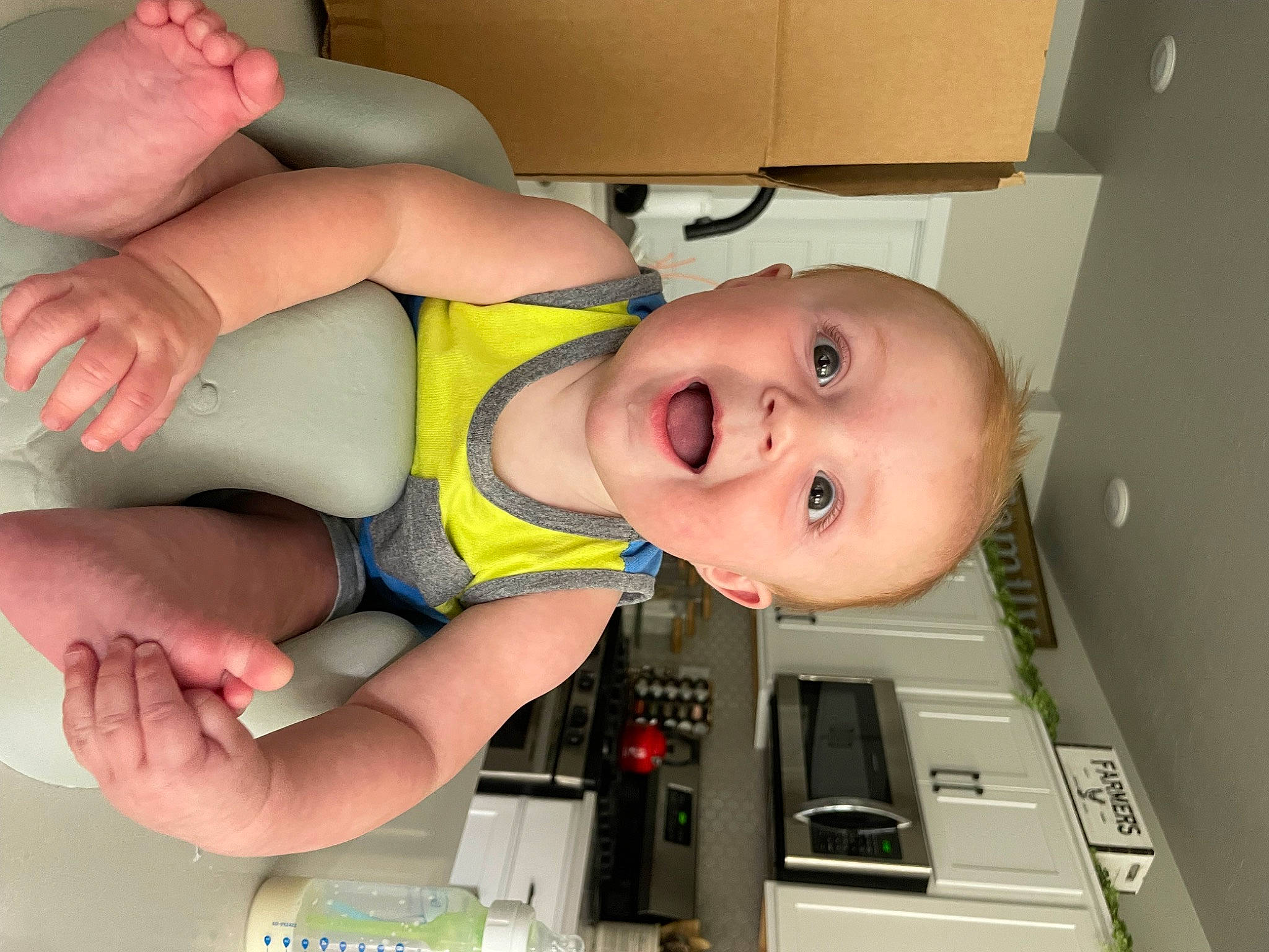 Caden is registered to the contest to win money with this photo: arm, baby, cheek, chest, child, eye, face, finger, hair, hand, head, mouth, muscle, nose, person, skin, smile, stomach, thigh, thumb