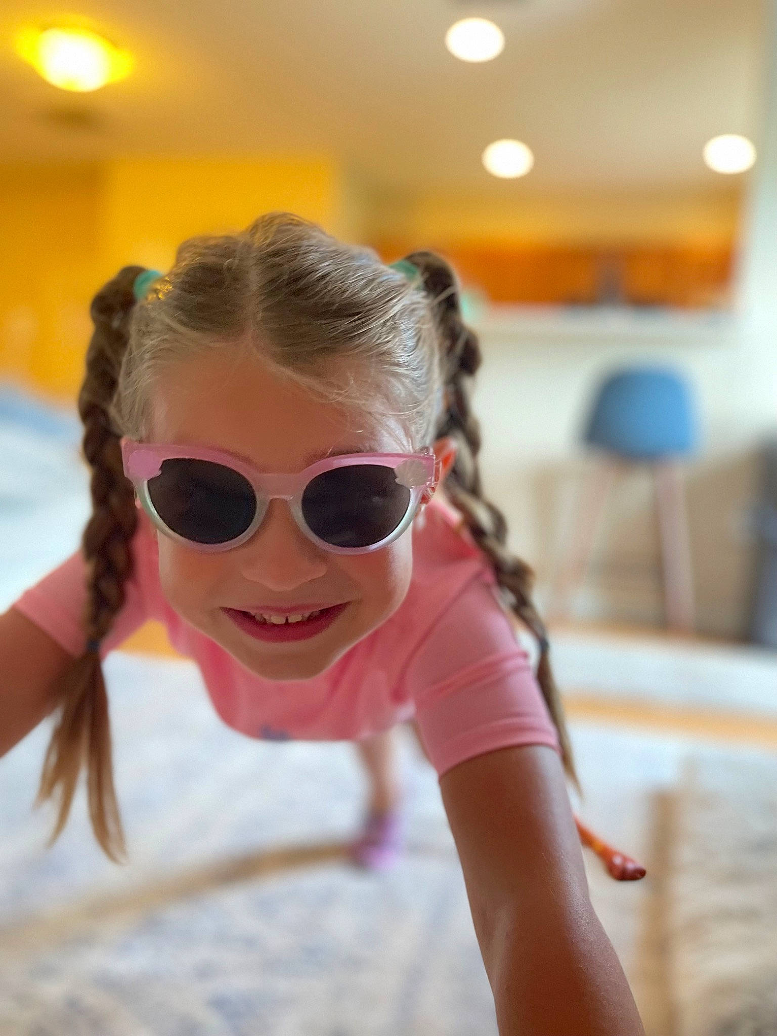 Delaney is registered to the contest to win money with this photo: audio_equipment, black_hair, eye_glass_accessory, eyebrow, eyelash, eyewear, fashion_design, flooring, fun, glasses, goggles, happy, headgear, joy, leisure, person, personal_protective_equipment, recreation, smile, sunglasses