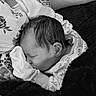 Aurora is registered to the contest to win money with this photo: newborn, baby, sleeping, blanket, pillow, floral, pattern, closeup, infant, cozy, resting, head, face, soft, cute, indoors, comfort, peaceful, child, portrait