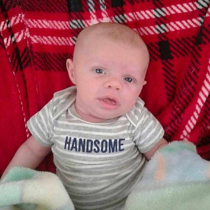 Jaxson joined the competition — help win amazing prizes! boy, cheek, child, chin, day, eye, face, facial_expression, forehead, head, human_hair_color, infant, mouth, nose, person, red, sitting, skin, smile, toddler