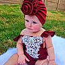 Jade joined the competition — help win amazing prizes! baby, backyard, bonnet, cap, clothing, costume, dress, face, flower, grass, hat, head, lawn, nature, outdoors, person, photography, plant, portrait, yard