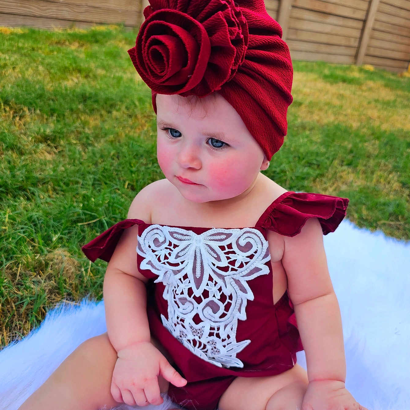 Jade joined the competition — help win amazing prizes! baby, backyard, bonnet, cap, clothing, costume, dress, face, flower, grass, hat, head, lawn, nature, outdoors, person, photography, plant, portrait, yard