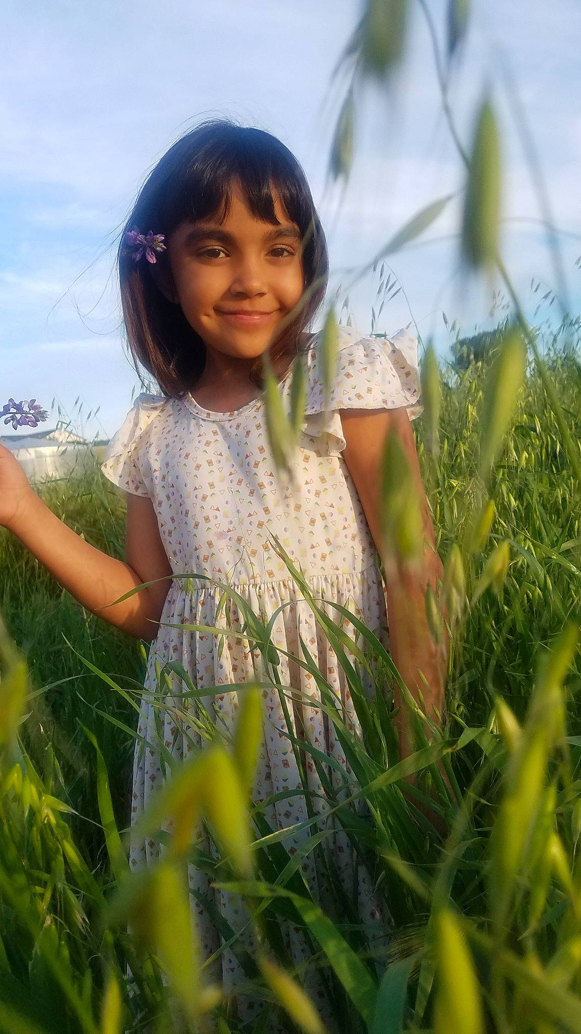 Lillyana is registered to the contest to win money with this photo: agriculture, black_hair, crop, grass, grass_family, happy, joy, lady, long_hair, meadow, people_in_nature, person, photography, plant, portrait, smile, summer, sunlight