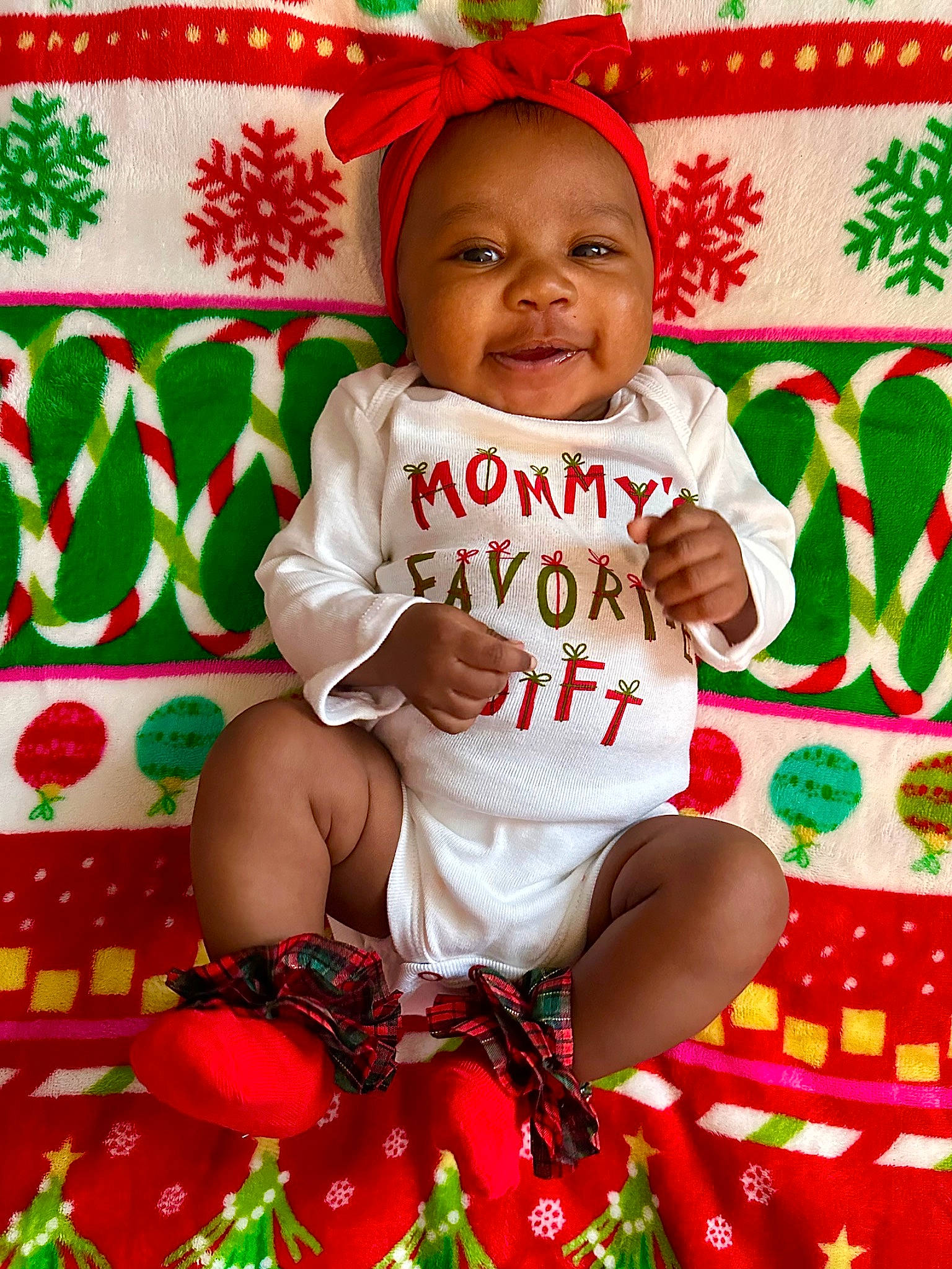 Rya joined the competition — help win amazing prizes! baby, baby_toddler_clothing, carmine, child, christmas_eve, event, green, happy, holiday, pattern, person, product, red, sitting, sleeve, smile, sock, sweetness, t_shirt, toddler