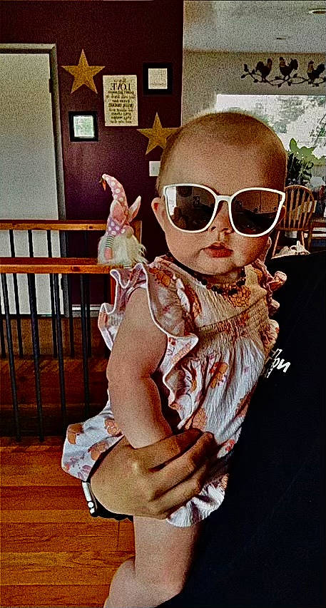 Riverlynn is registered to the contest to win money with this photo: baby, baby_toddler_clothing, blond, chest, child, eyelash, eyewear, fashion_design, fawn, fun, glasses, goggles, hairstyle, neck, person, pink, sitting, sunglasses, thigh, toddler