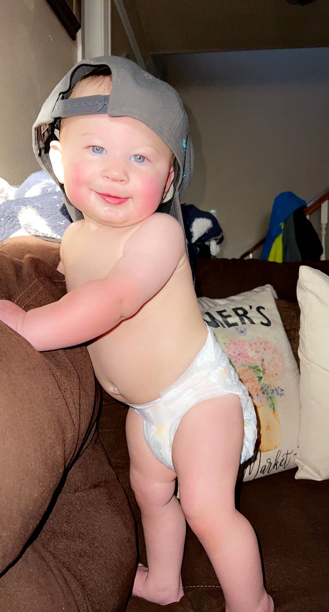 Colt is registered to the contest to win money with this photo: abdomen, arm, baby, chest, comfort, eye, finger, flash_photography, headgear, headwear, human_body, joy, knee, leg, person, shoulder, skin, smile, swimwear, textile