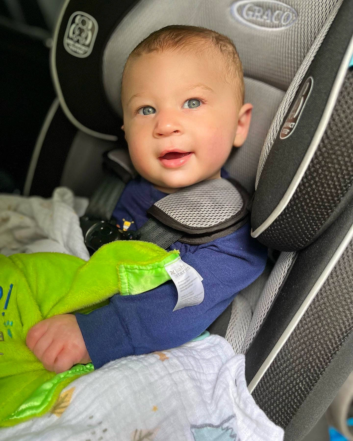 Colt is registered to the contest to win money with this photo: auto_part, automotive_design, baby, baby_products, blue, car_seat, car_seat_cover, child, comfort, electric_blue, family_car, flash_photography, luxury_vehicle, motor_vehicle, person, personal_luxury_car, smile, steering_wheel, toddler, vehicle_door