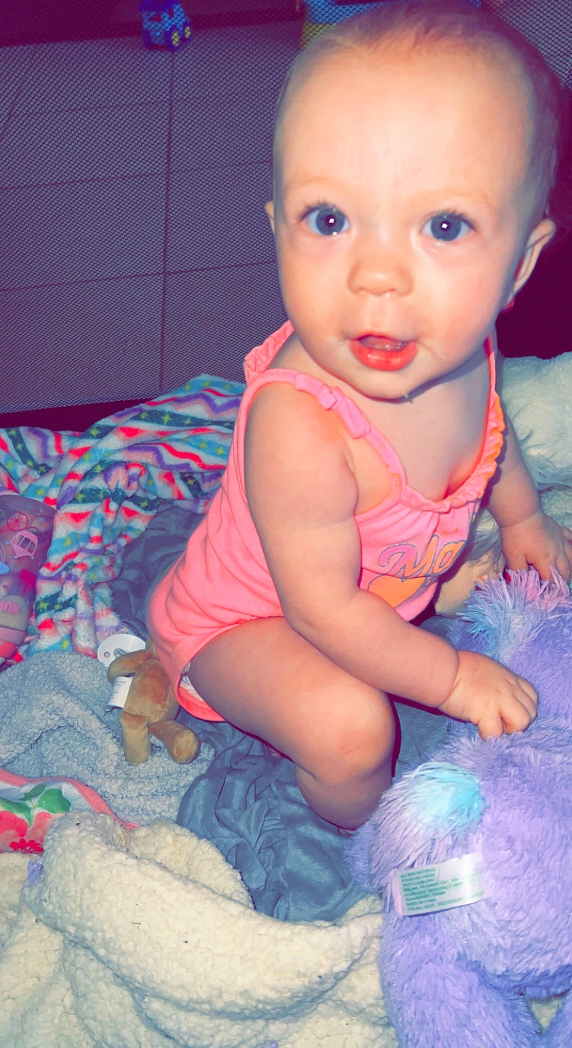 Adalynn is registered to the contest to win money with this photo: baby, baby_toddler_clothing, blue, cheek, child, comfort, electric_blue, finger, fun, happy, iris, mouth, nose, pattern, person, pink, purple, sitting, skin, smile