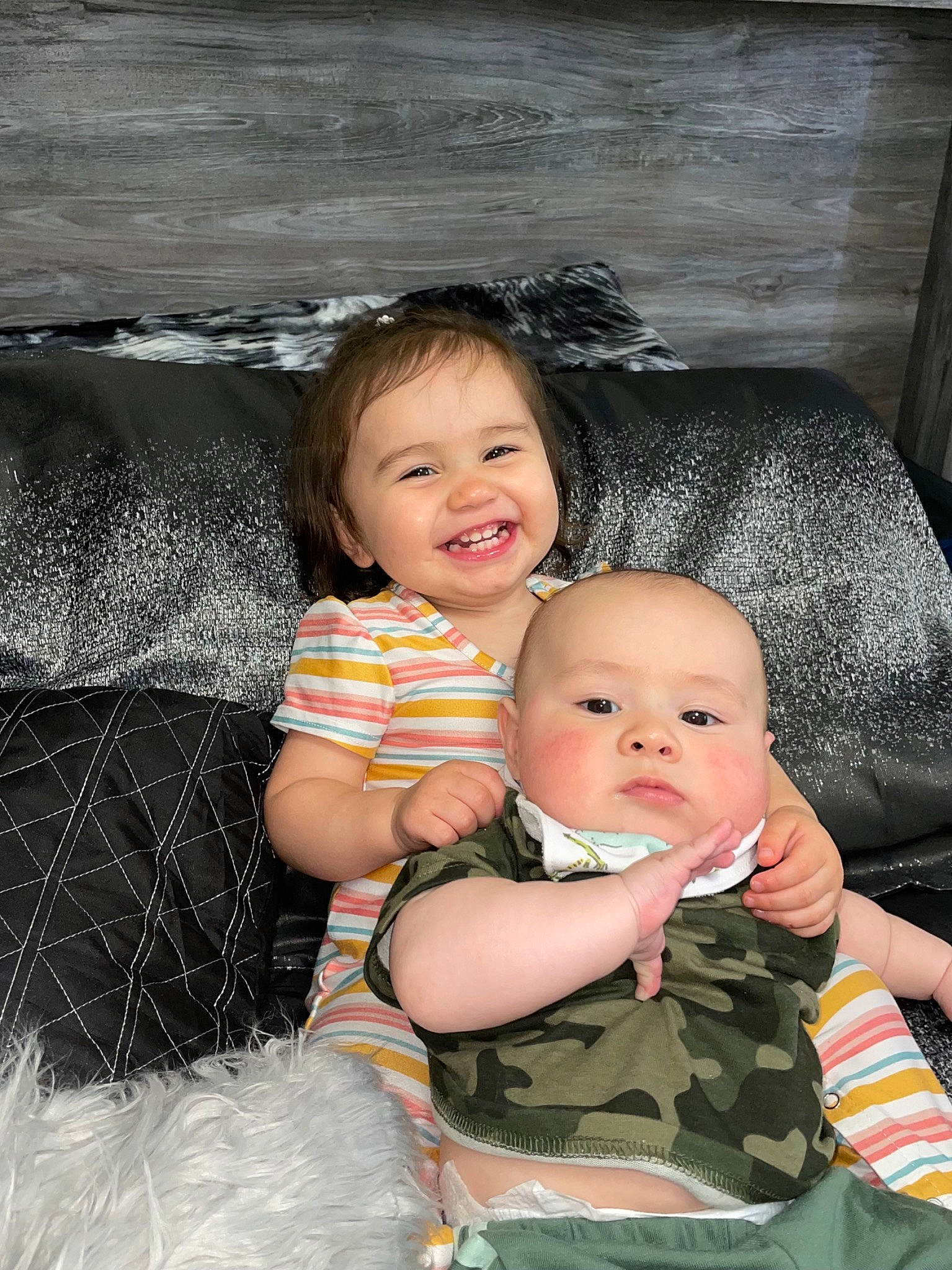 Adaline is registered to the contest to win money with this photo: baby, baby_toddler_clothing, black, cheek, child, chin, event, eye, face, flash_photography, fun, happy, iris, joy, mammal, pattern, person, sitting, skin, smile