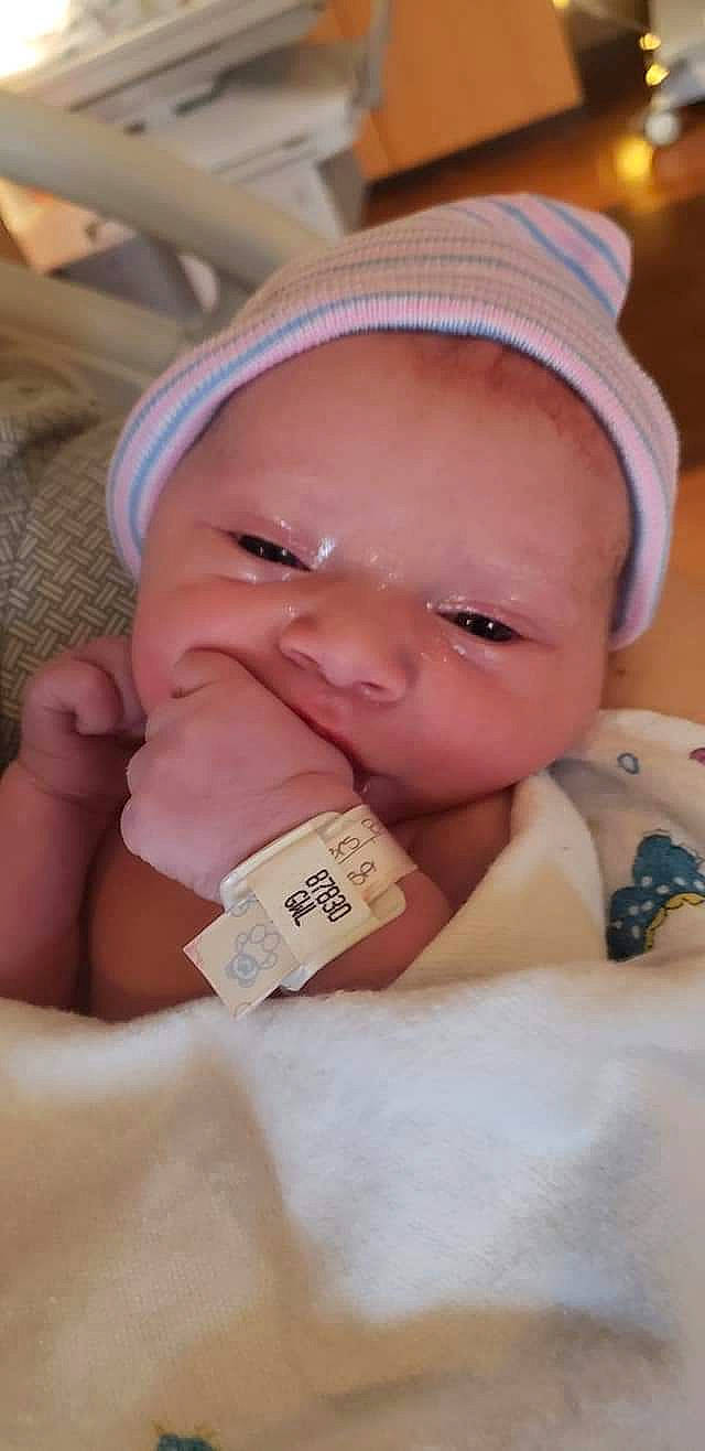 Addalynn is registered to the contest to win money with this photo: baby, cheek, chin, comfort, eyebrow, eyelash, facial_expression, finger, gesture, happy, hat, lip, mouth, nail, nose, person, pink, skin, smile, thumb