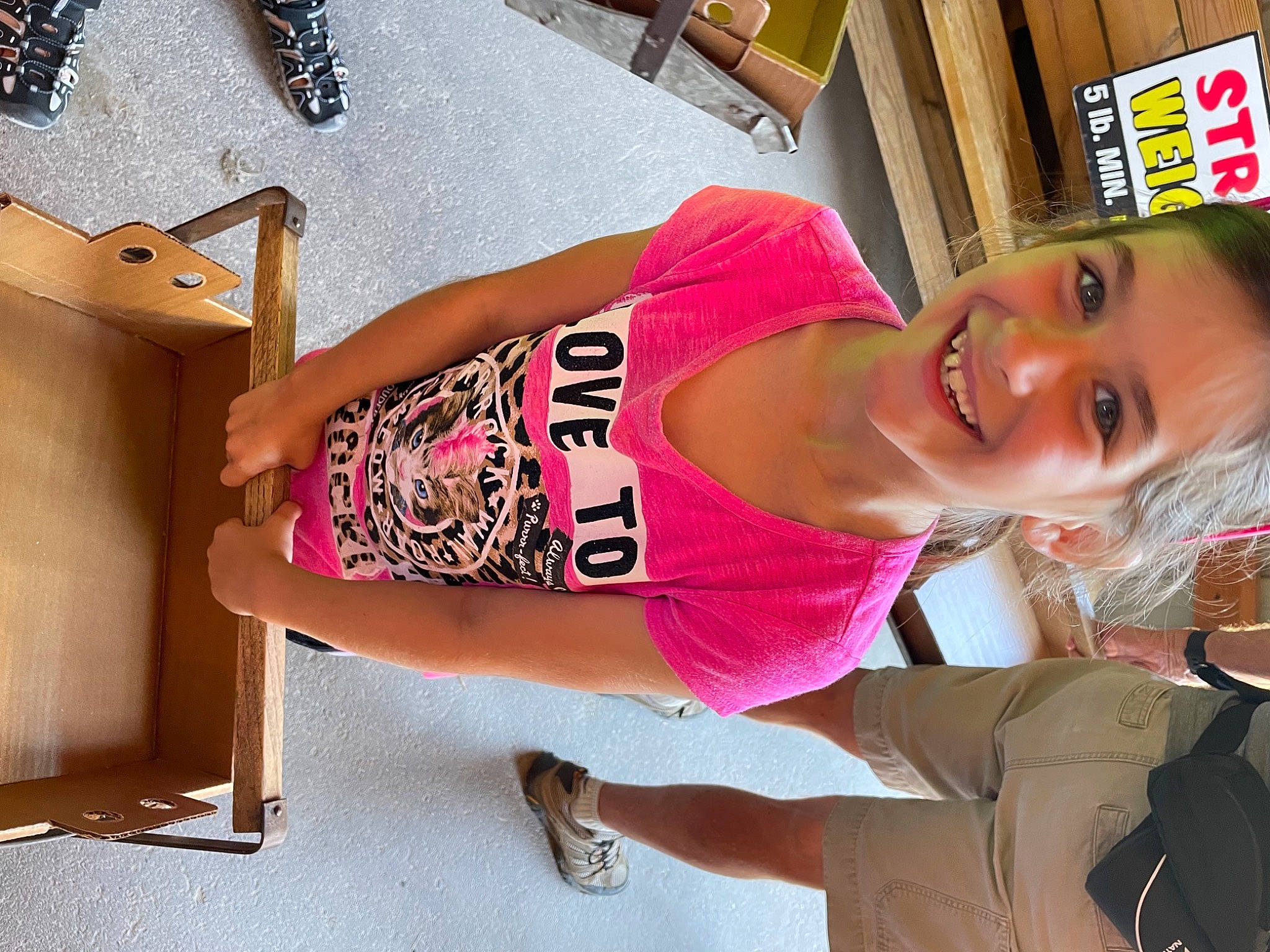 Josslynn is registered to the contest to win money with this photo: abdomen, elbow, flooring, fun, happy, hat, head, human_leg, joint, joy, knee, leg, leisure, magenta, person, pink, smile, sportswear, street_fashion, thigh