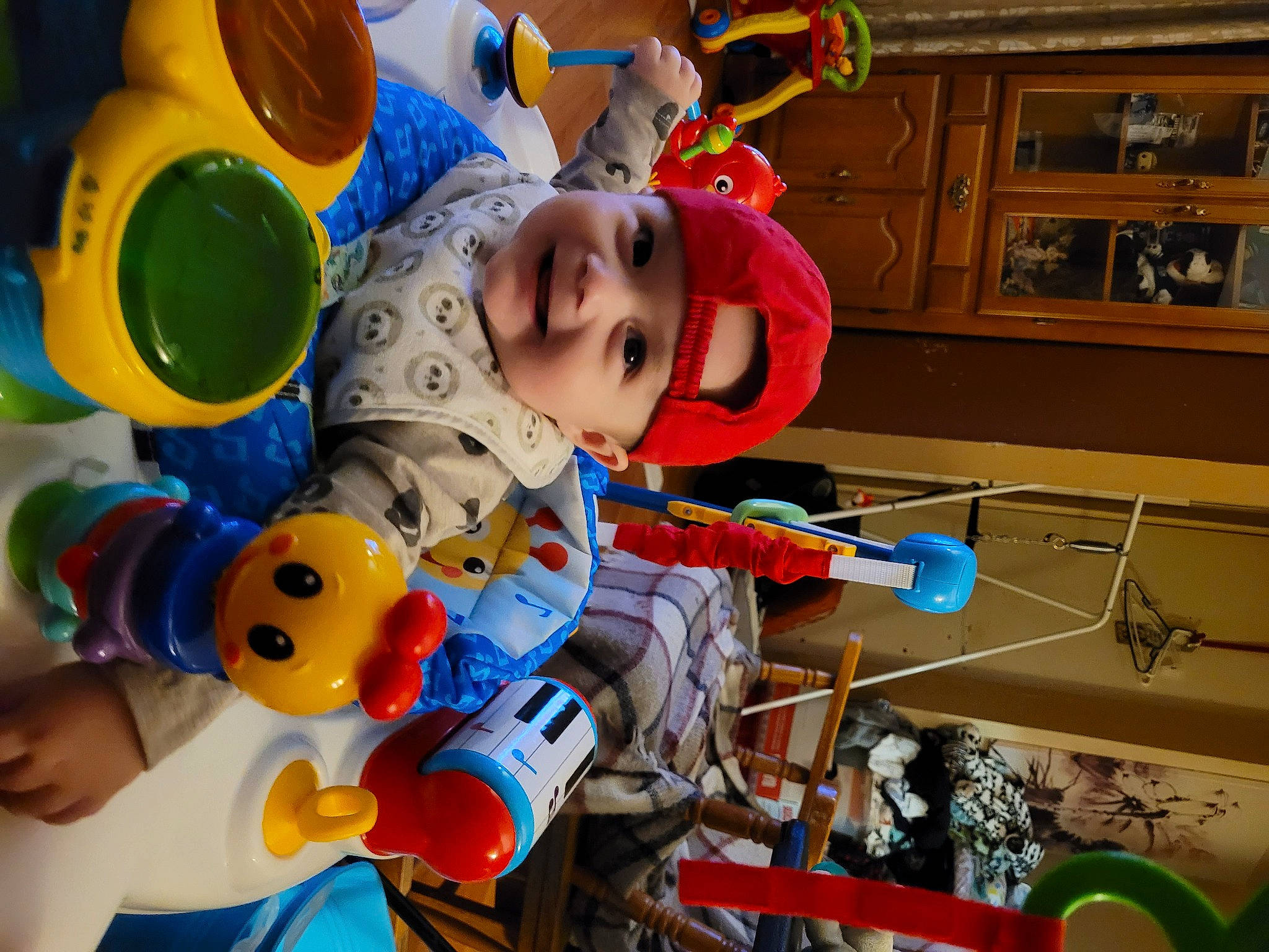 Marcus is registered to the contest to win money with this photo: animation, baby, baby_products, baby_toys, cabinetry, child, event, fictional_character, fun, happy, headwear, joy, leisure, party_supply, person, picture_frame, plastic, play, recreation, room