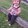 Ember is registered to the contest to win money with this photo: toddler, child, grass, outdoor, pigtails, smile, barefoot, pants, striped_shirt, wooden_border, car, vehicle, greenery, face, person, daylight, happy, nature, grass_stains, playful