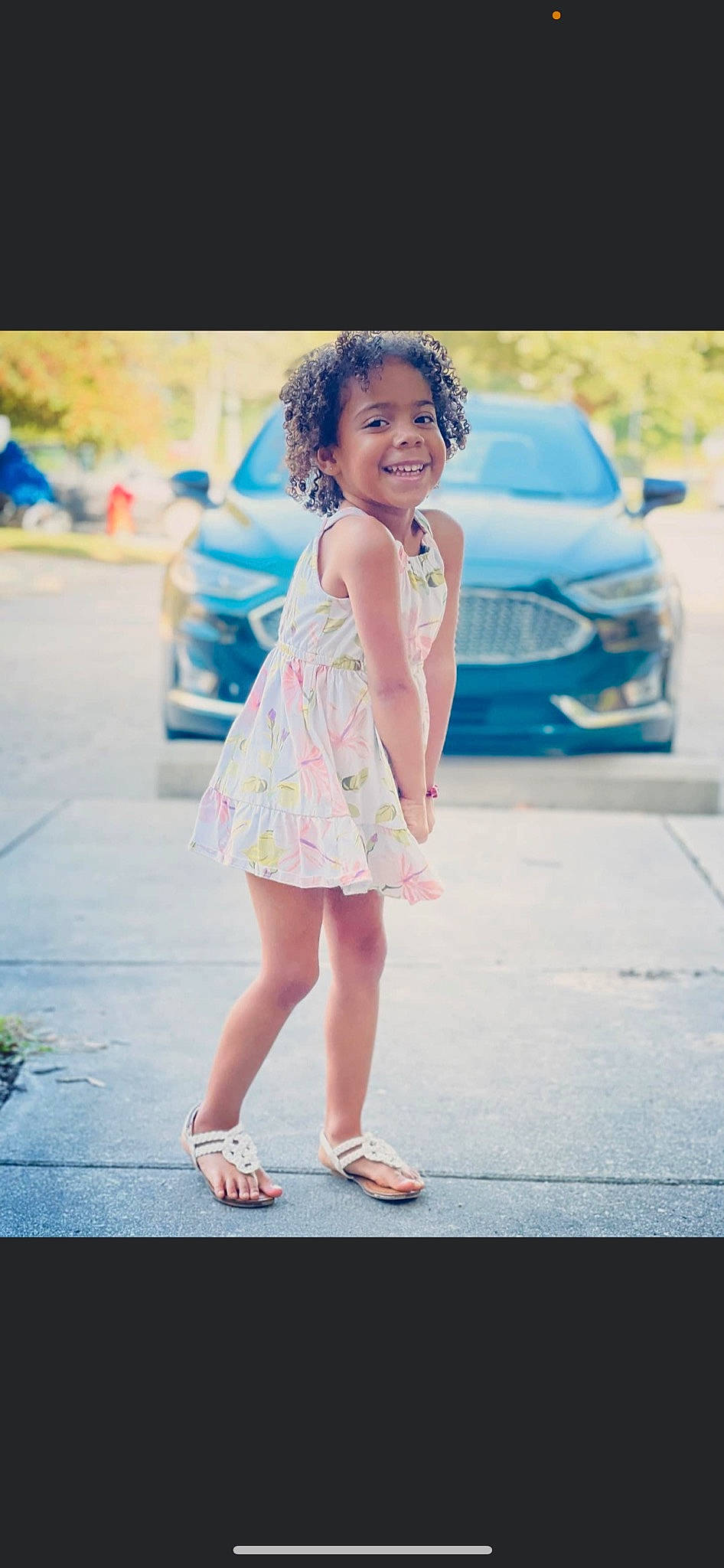 Kinzley is registered to the contest to win money with this photo: automotive_design, car, day_dress, electric_blue, family_car, flash_photography, foot, formal_wear, happy, human_leg, joy, leisure, magenta, person, road, sandal, smile, summer, thigh, toddler
