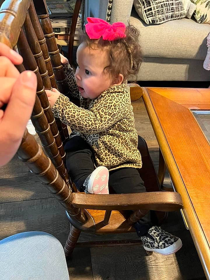 Izzabella joined the competition — help win amazing prizes! baby, baby_products, chair, child, comfort, desk, eyewear, fashion_accessory, fun, lap, leisure, person, play, plucked_string_instruments, recreation, sitting, string_instrument, table, toddler, wood