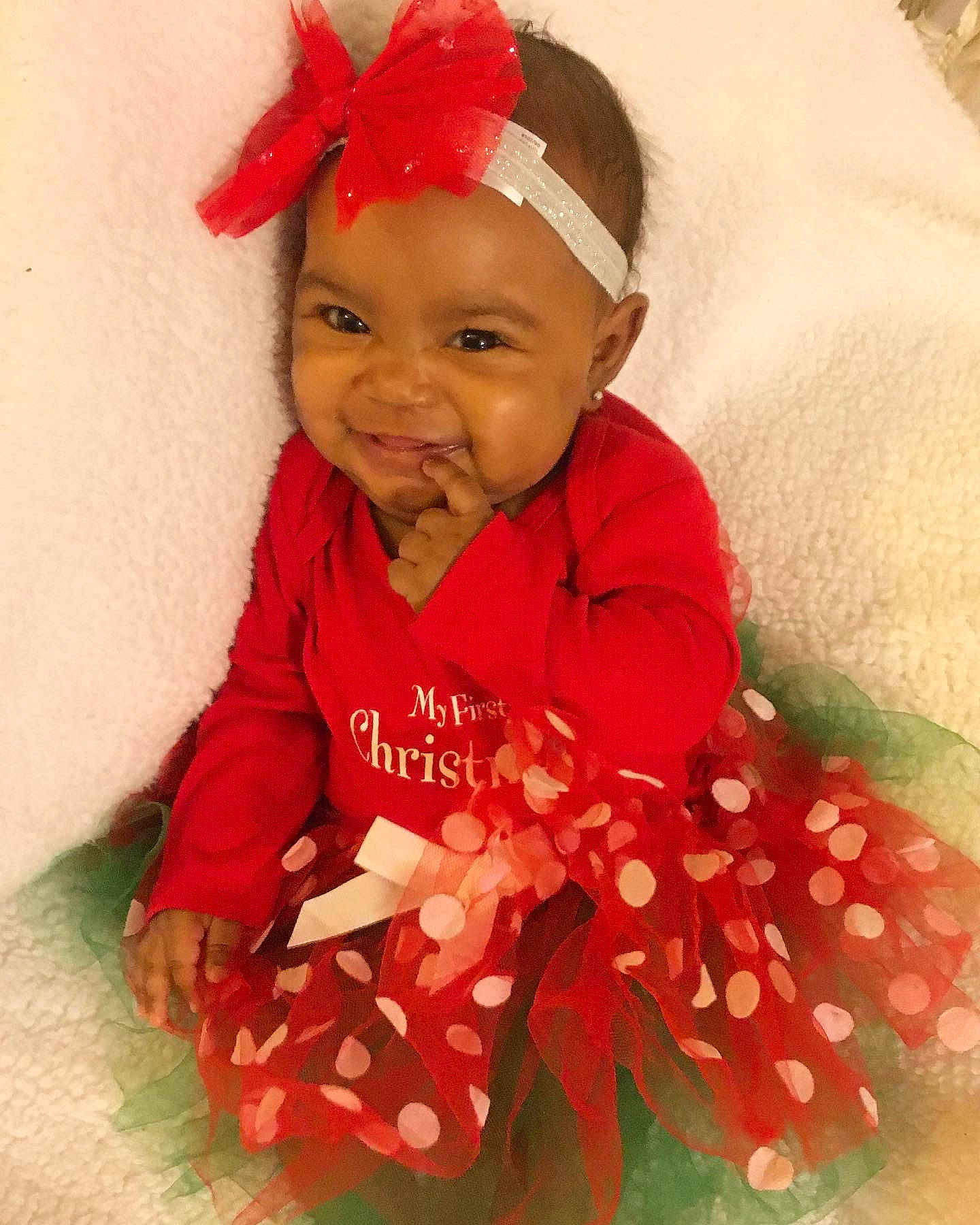 Journei is registered to the contest to win money with this photo: baby, baby_products, baby_toddler_clothing, cheek, child, clothing, costume, face, fashion_accessory, hair_accessory, head, headband, headgear, person, pink, red, skin, smile, toddler