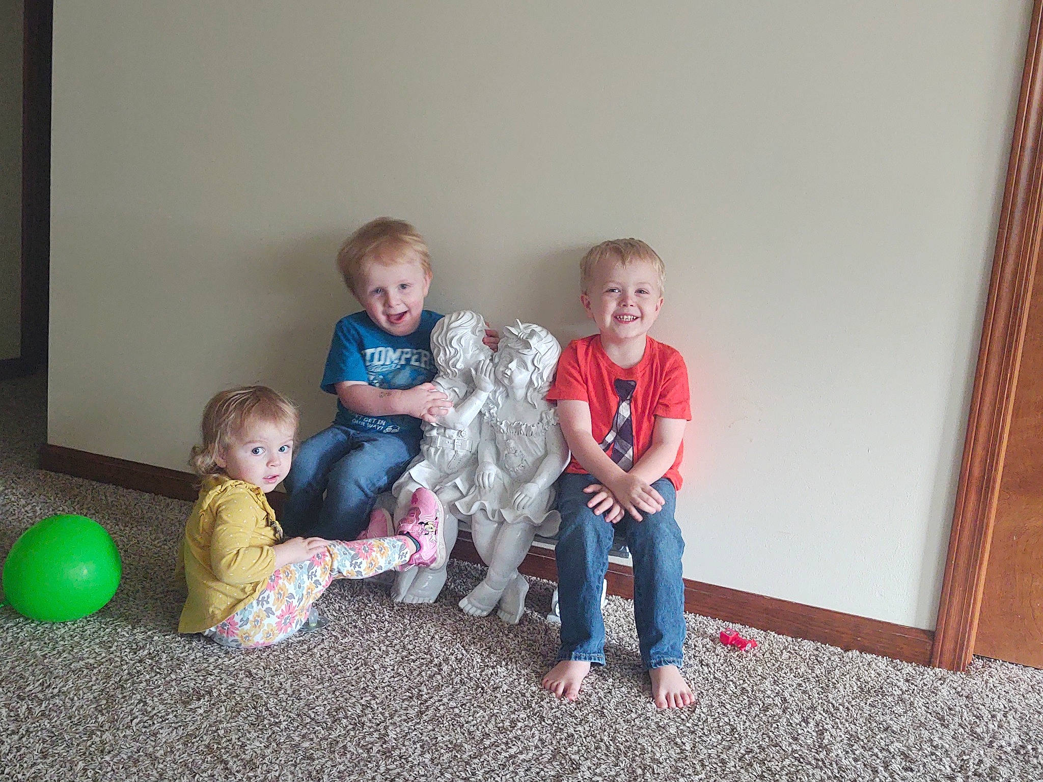 David is registered to the contest to win money with this photo: baby, baby_toddler_clothing, ball, child, comfort, event, floor, flooring, fun, happy, home, joy, knee, lap, leg, leisure, person, sitting, smile, t_shirt