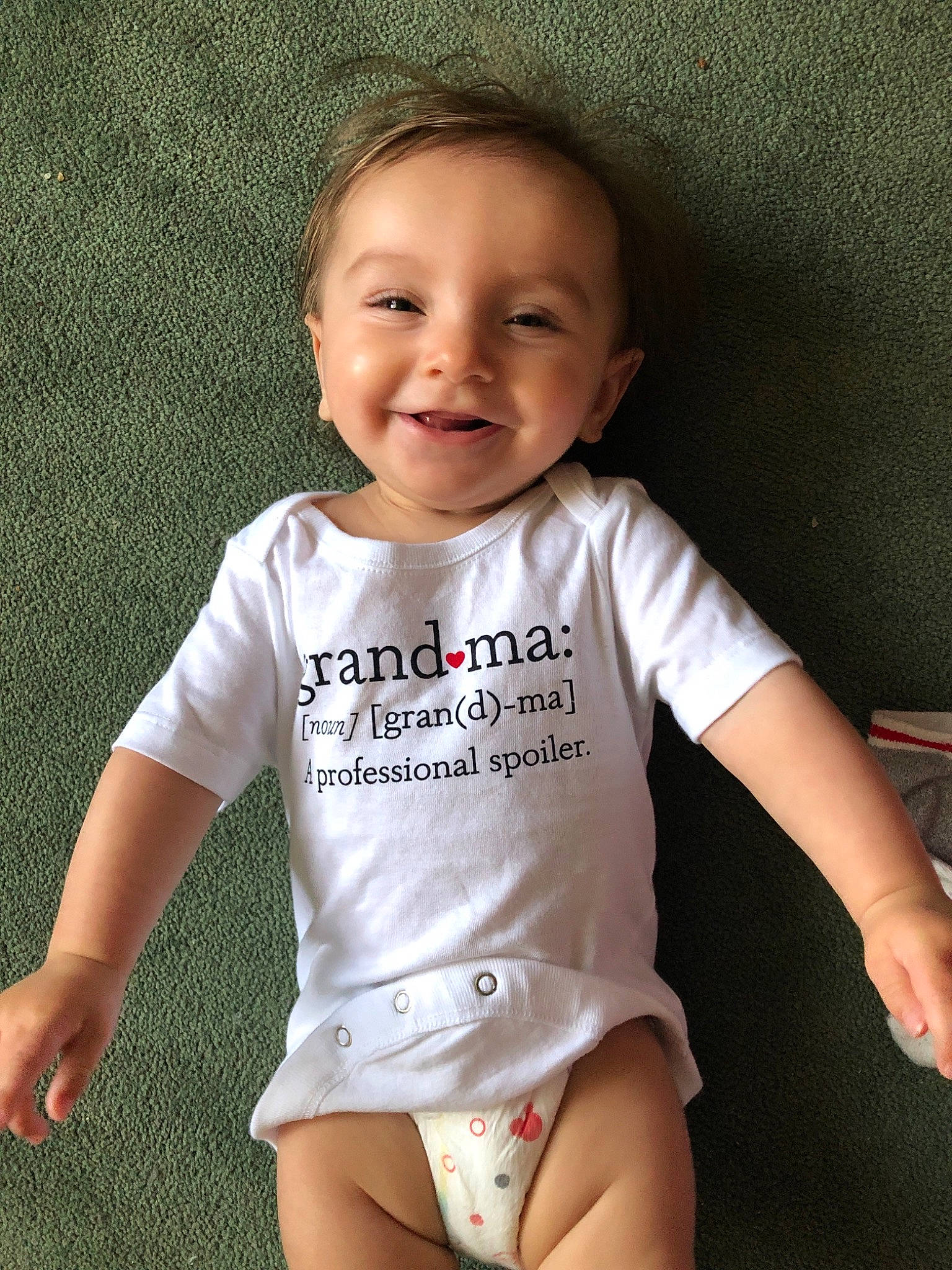 Maéva joined the competition — help win amazing prizes! baby, baby_products, baby_toddler_clothing, cheek, child, child_model, happy, head, leg, person, sitting, skin, sleeve, smile, t_shirt, toddler, top