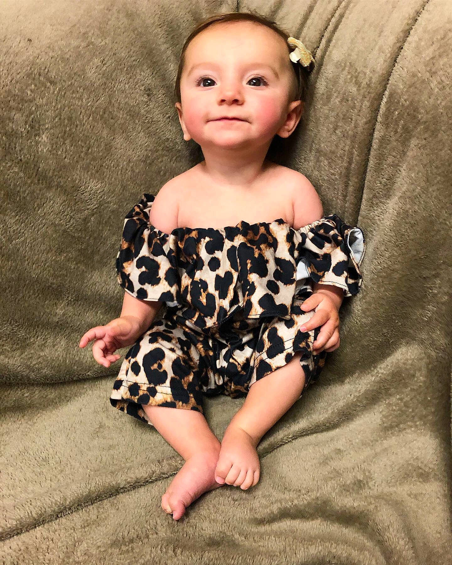 Maéva joined the competition — help win amazing prizes! baby, baby_toddler_clothing, child, child_model, design, dress, eye, face, fawn, head, lip, pattern, person, photography, sitting, skin, sleeve, smile, toddler