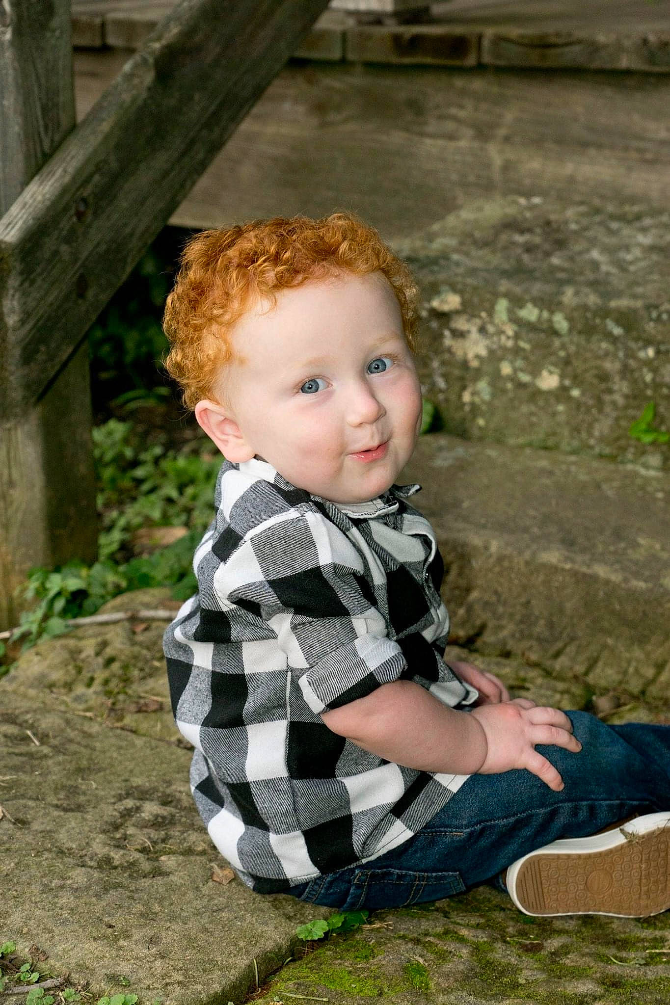 Travis is registered to the contest to win money with this photo: child, eye, face, flash_photography, grass, hair, hairstyle, happy, head, leaf, leg, person, plaid, plant, shirt, sleeve, smile, tartan, toddler, tree