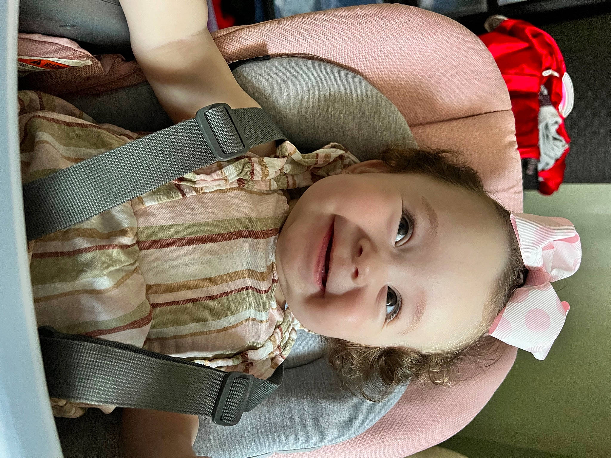 Eliana is registered to the contest to win money with this photo: baby, baby_products, baby_toddler_clothing, car_seat, cheek, chest, child, comfort, eyelash, eyewear, happy, iris, joy, lip, mouth, nose, pattern, person, sitting, skin