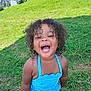 Bessie joined the competition — help win amazing prizes! child, smiling, happy, swimsuit, blue, curly_hair, grass, outdoor, summer, playful, sunny, young, person, nature, laughing, fun, greenery, cute, joy, toddler