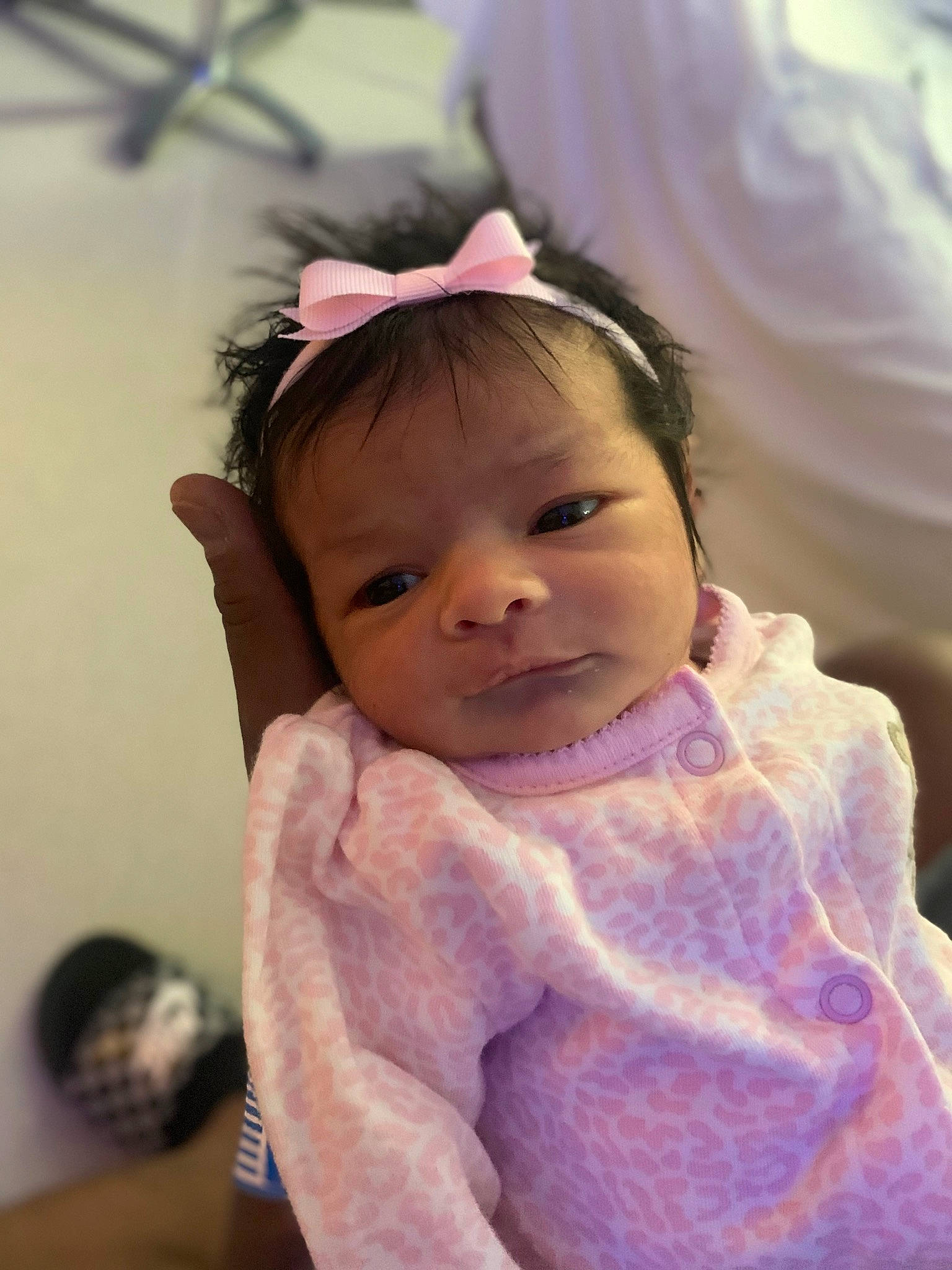 Zhavia is registered to the contest to win money with this photo: baby, baby_toddler_clothing, cheek, child, chin, eyebrow, eyelash, face, fashion_accessory, fun, happy, iris, lip, neck, person, pink, sitting, skin, sleeve, smile