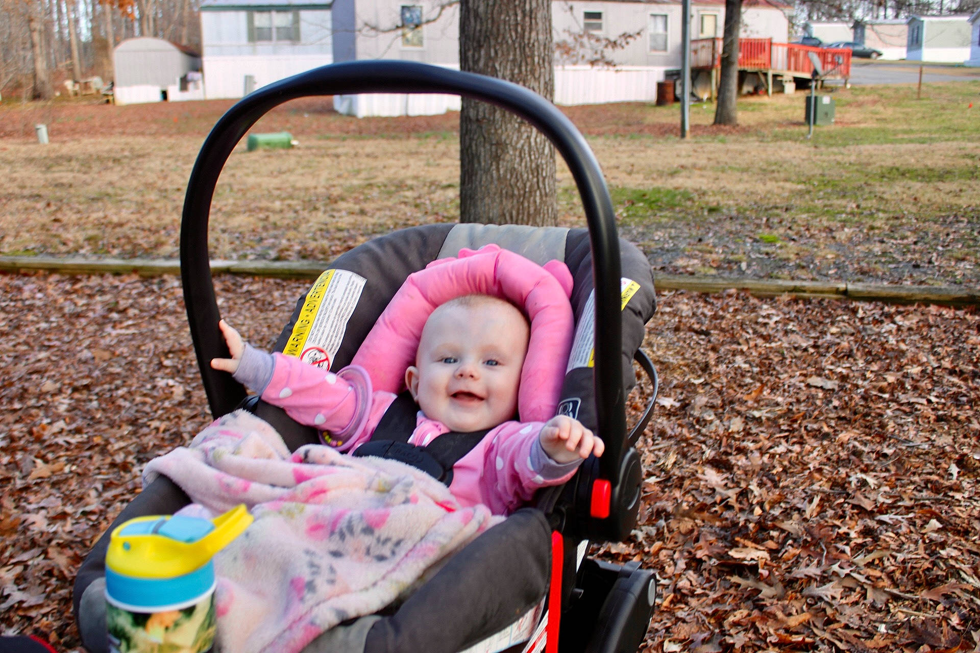 Danika joined the competition — help win amazing prizes! baby, baby_carriage, baby_products, baby_toddler_clothing, child, city, comfort, fun, grass, leisure, motor_vehicle, person, photograph, plant, recreation, sitting, smile, soil, toddler, tree