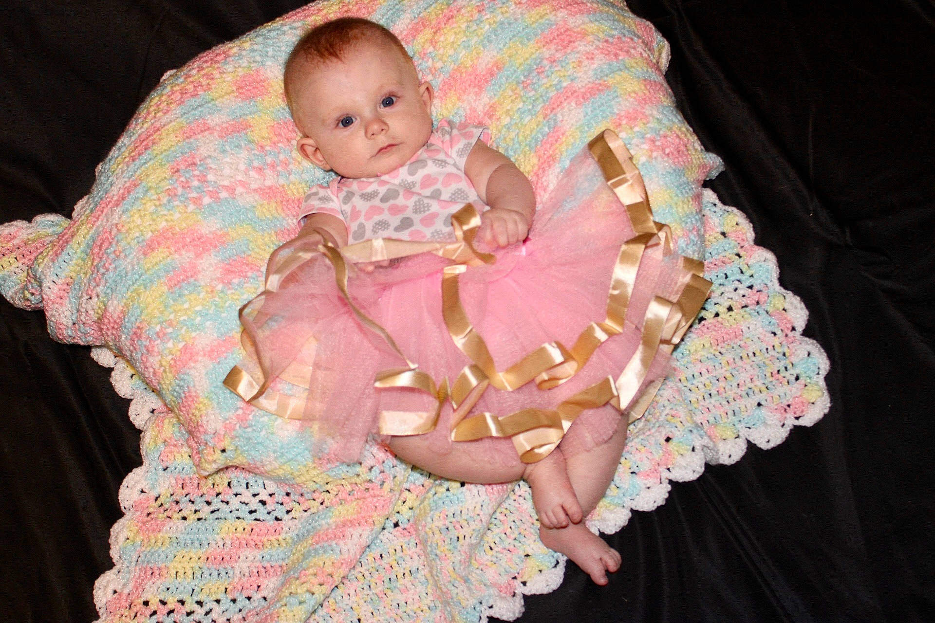 Danika joined the competition — help win amazing prizes! baby, baby_products, baby_toddler_clothing, cheek, child, comfort, day_dress, embellishment, lap, linens, magenta, pattern, peach, person, pink, ruffle, sitting, sleeve, toddler