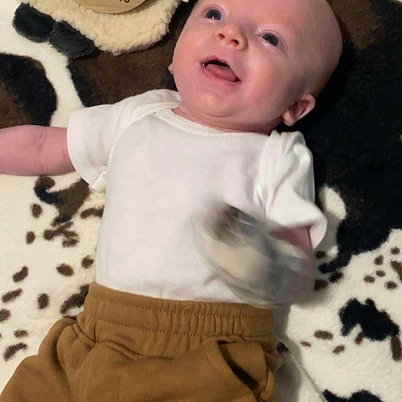 Easton joined the competition — help win amazing prizes! accessories, baby, clothing, cushion, diaper, face, glasses, glove, head, homedecor, indoors, newborn, pants, person, photography, portrait, shorts, sleeping, t_shirt, tape