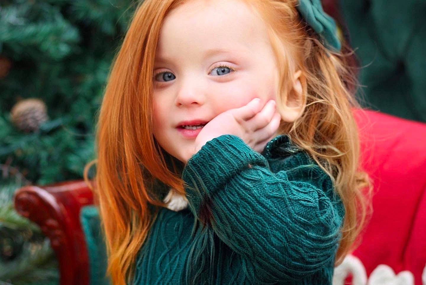 Mazie June is registered to the contest to win money with this photo: electric_blue, eye, face, facial_expression, finger, fun, grass, hair, hairstyle, happy, head, iris, leisure, lip, organ, outerwear, people, people_in_nature, person, smile