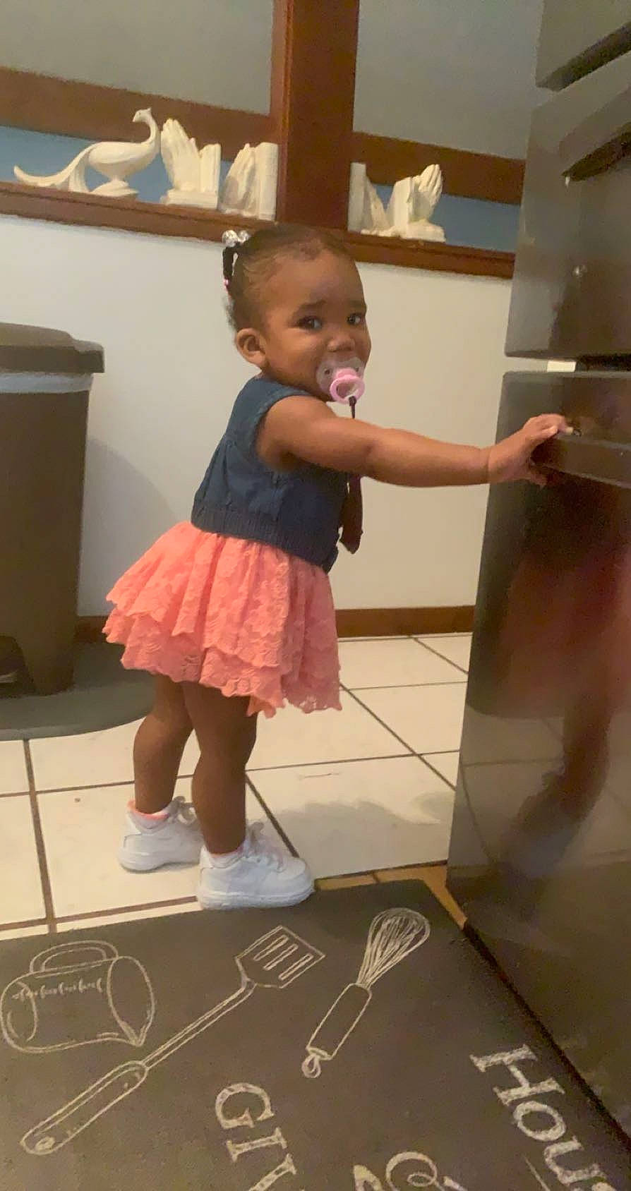 Kehlani joined the competition — help win amazing prizes! baby_toddler_clothing, beauty, child, floor, flooring, fun, gesture, human_leg, joint, leg, person, pink, purple, room, shoulder, skin, smile, sock, standing, toddler