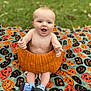 Ezra joined the competition — help win amazing prizes! baby, pumpkin, blanket, outdoor, grass, happy, cute, sock, child, fall, halloween, playful, smiling, seasonal, holiday, sitting, toy, nature, fun, portrait