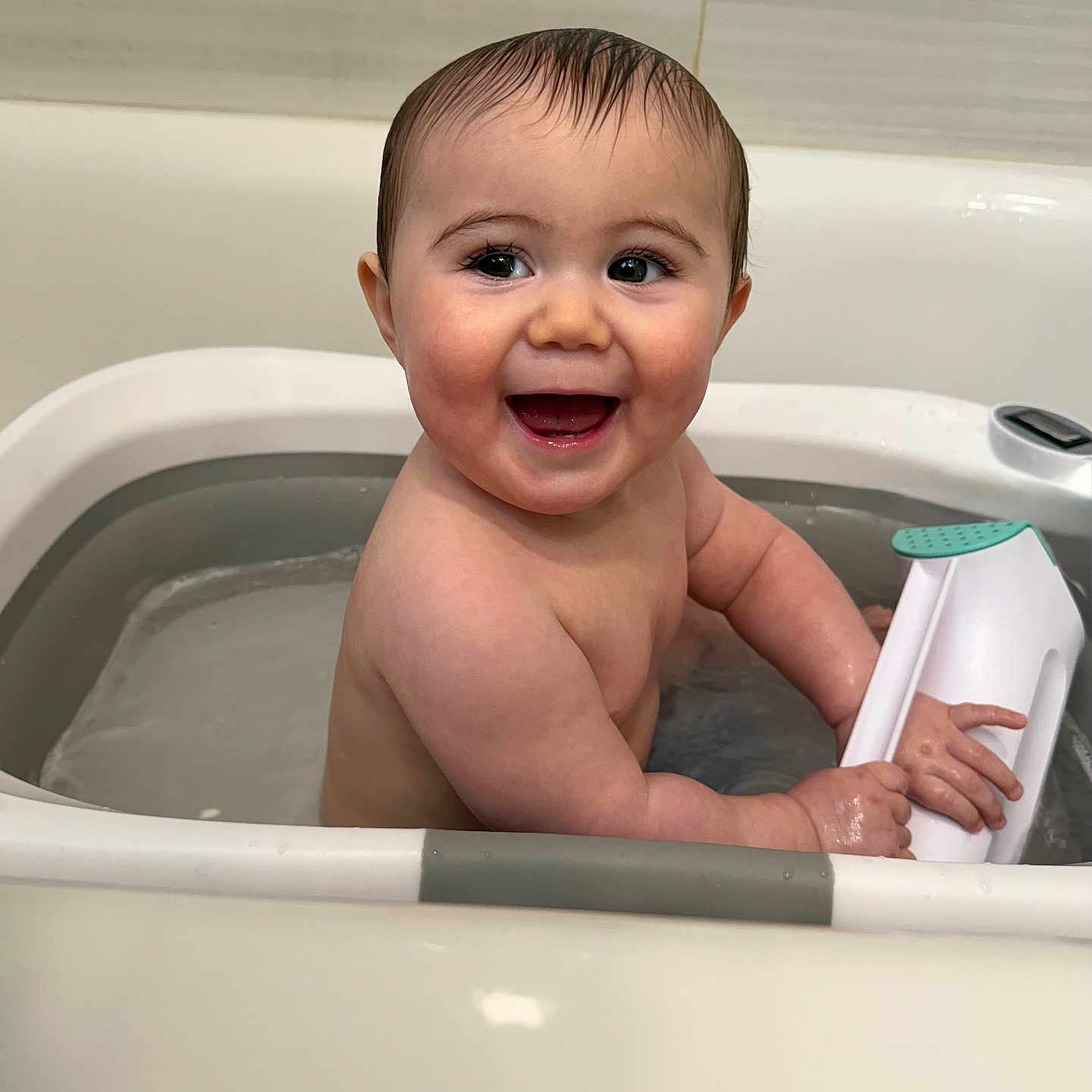 Kane joined the competition — help win amazing prizes! baby, bath, bathroom, bathtub, child, clean, cute, fun, happy, indoor, infant, person, playful, sitting, skin, smiling, toy, water, wet_hair, young_child