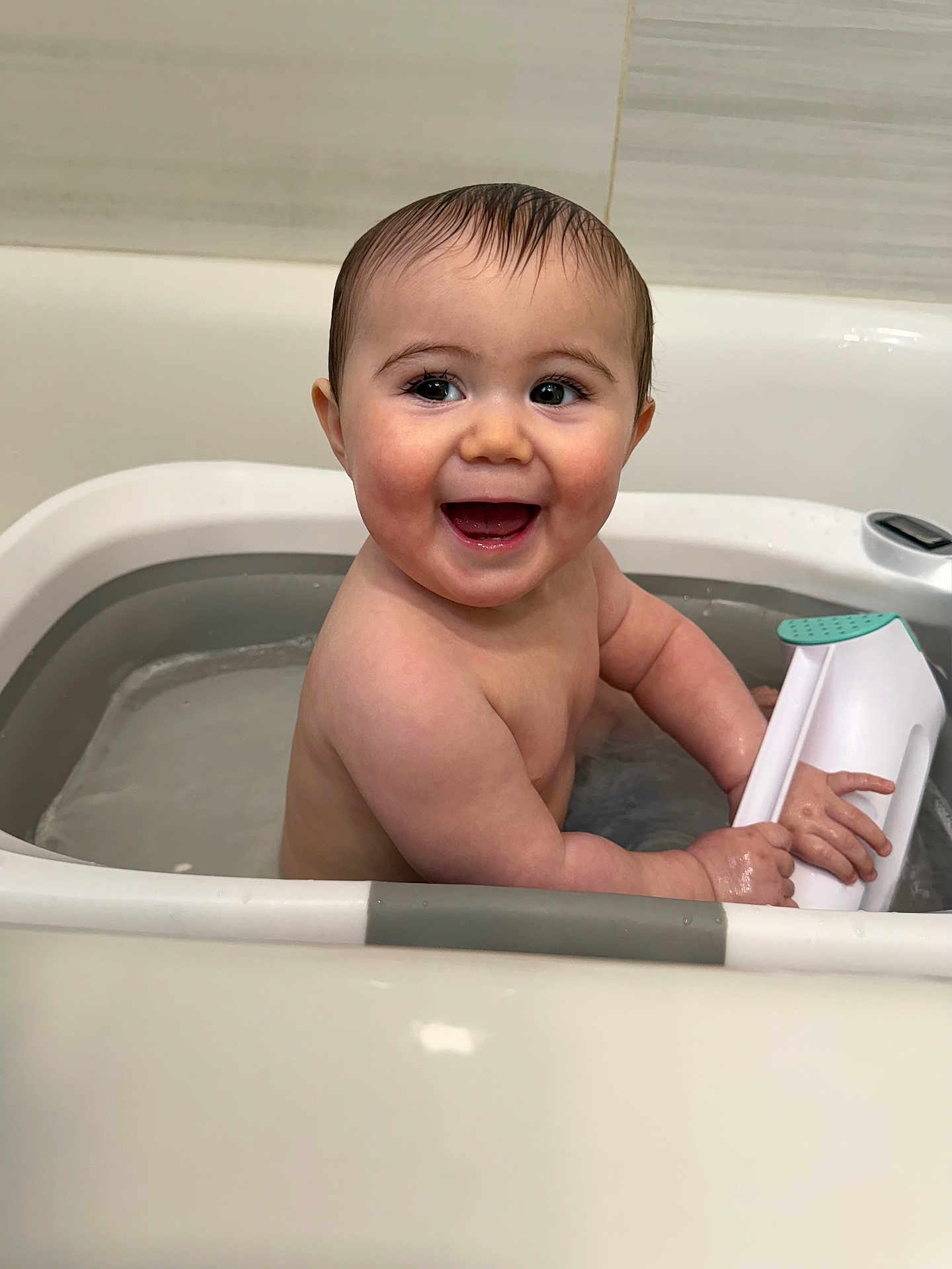Kane joined the competition — help win amazing prizes! baby, bath, bathroom, bathtub, child, clean, cute, fun, happy, indoor, infant, person, playful, sitting, skin, smiling, toy, water, wet_hair, young_child