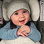 Kane joined the competition — help win amazing prizes! baby, child, infant, hat, bear_ears, blue_sweater, car_seat, blanket, smiling, happy, hands_clasped, cute, portrait, indoors, seatbelt, close_up, headwear, face, young_child, cozy