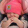 baby, beanie, pink, car_seat, blanket, infant, hands, clothing, cute, face, child, sitting, warm, wrapped, cozy, soft, headwear, apparel, portrait, sleepy