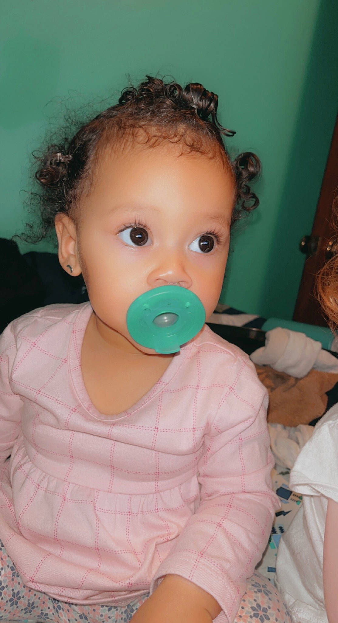 Melody is registered to the contest to win money with this photo: audio_equipment, baby, baby_products, baby_toddler_clothing, cheek, child, chin, ear, eyelash, fun, happy, iris, lip, mouth, neck, nose, person, pink, skin, sleeve