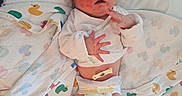 Corey joined the competition — help win amazing prizes! ankle_band, baby, bed, blanket, clamp, diaper, duck_pattern, hospital, indoors, infant, newborn, patterned_blanket, peaceful, resting, skin, sleeping, small_feet, small_hands, umbilical_cord, white_shirt