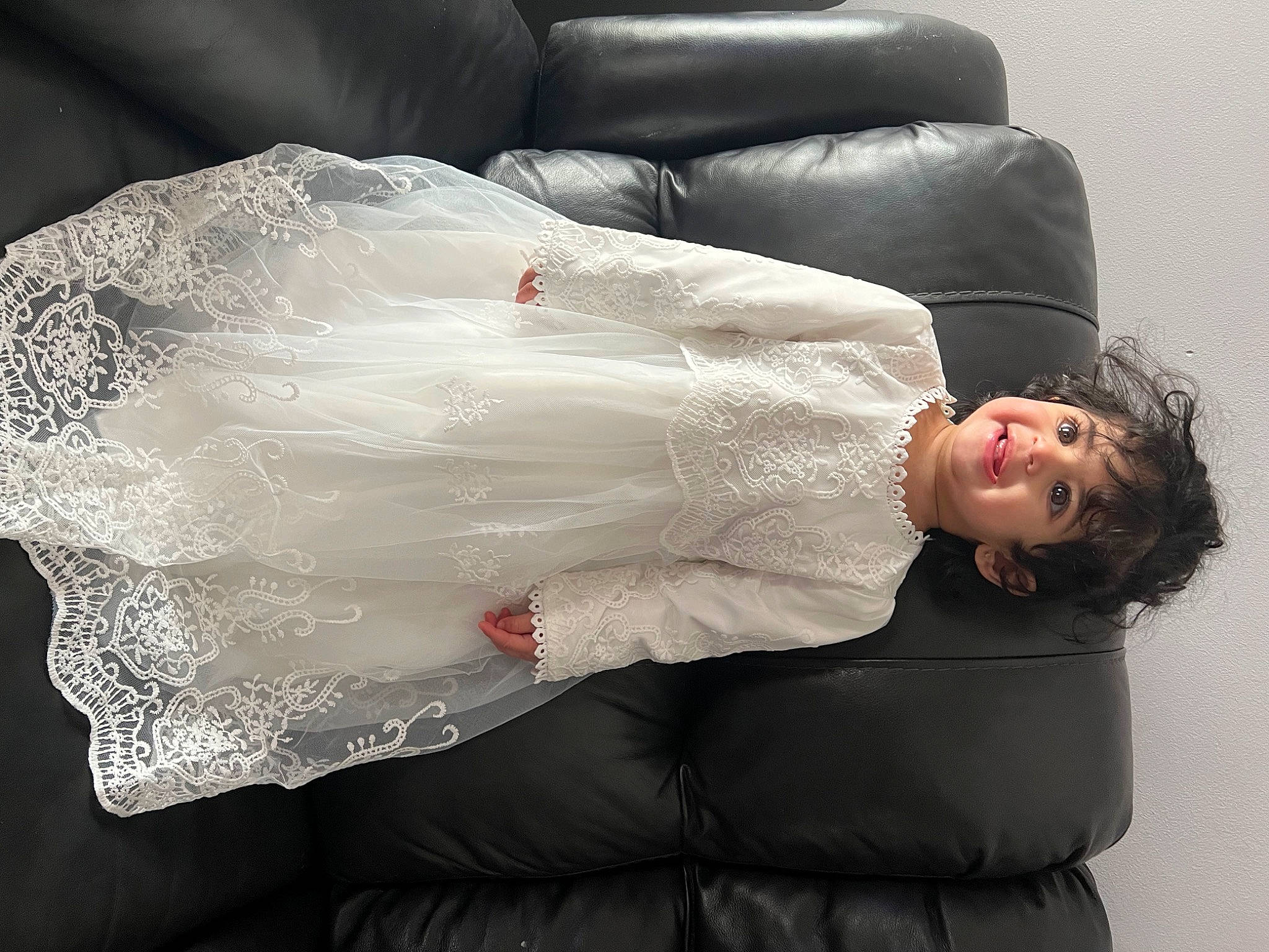 Mia is registered to the contest to win money with this photo: arm, comfort, couch, dress, elbow, fashion, flash_photography, human_body, human_leg, joint, joy, knee, leg, lip, neck, outerwear, person, shoulder, sleeve, textile