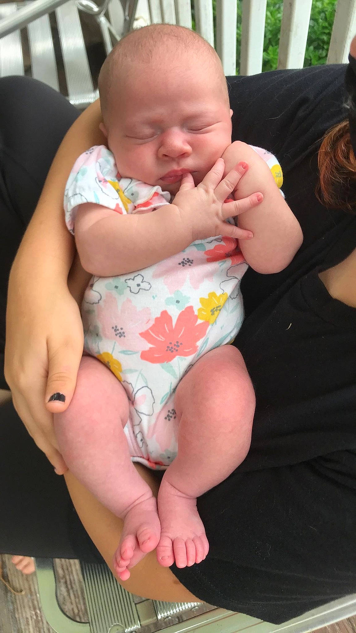 Emma is registered to the contest to win money with this photo: arm, baby, cheek, comfort, finger, hair, hand, happy, head, human_body, lap, leg, mouth, muscle, neck, organ, person, pink, skin, stomach