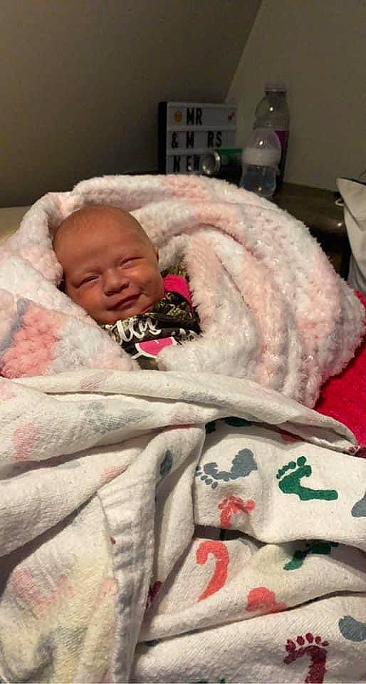 Emma is registered to the contest to win money with this photo: baby, baby_sleeping, bed, bed_sheet, bedding, bedtime, child, comfort, event, fur, kitchen_appliance, linens, nap, person, plastic_bottle, room, skin, tableware, toddler, water_bottle