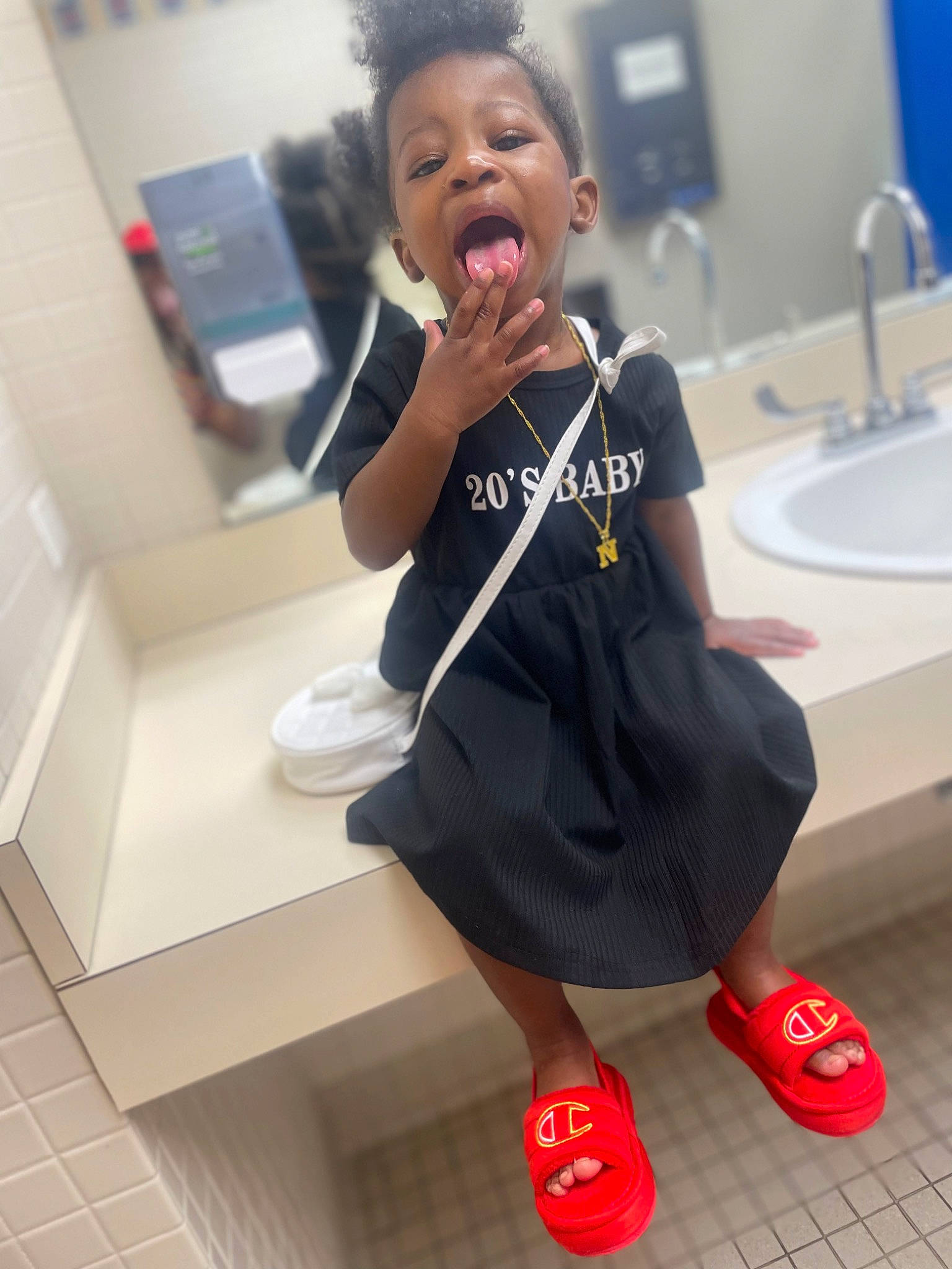 Nalani joined the competition — help win amazing prizes! child, elbow, face, fashion, flooring, fun, gesture, happy, human_leg, joint, knee, person, sink, skin, sleeve, sportswear, standing, t_shirt, thigh, toddler