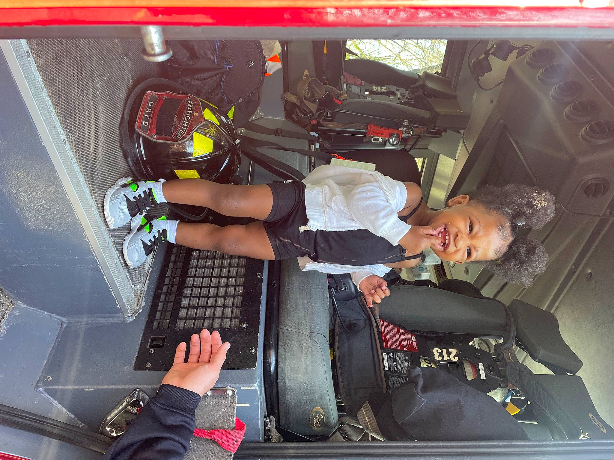 Nalani is registered to the contest to win money with this photo: auto_part, automotive_design, automotive_exterior, automotive_tire, automotive_wheel_system, bumper, engineering, flash_photography, helmet, human_leg, machine, motor_vehicle, person, rim, smile, technology, thigh, tire, vehicle, vehicle_door