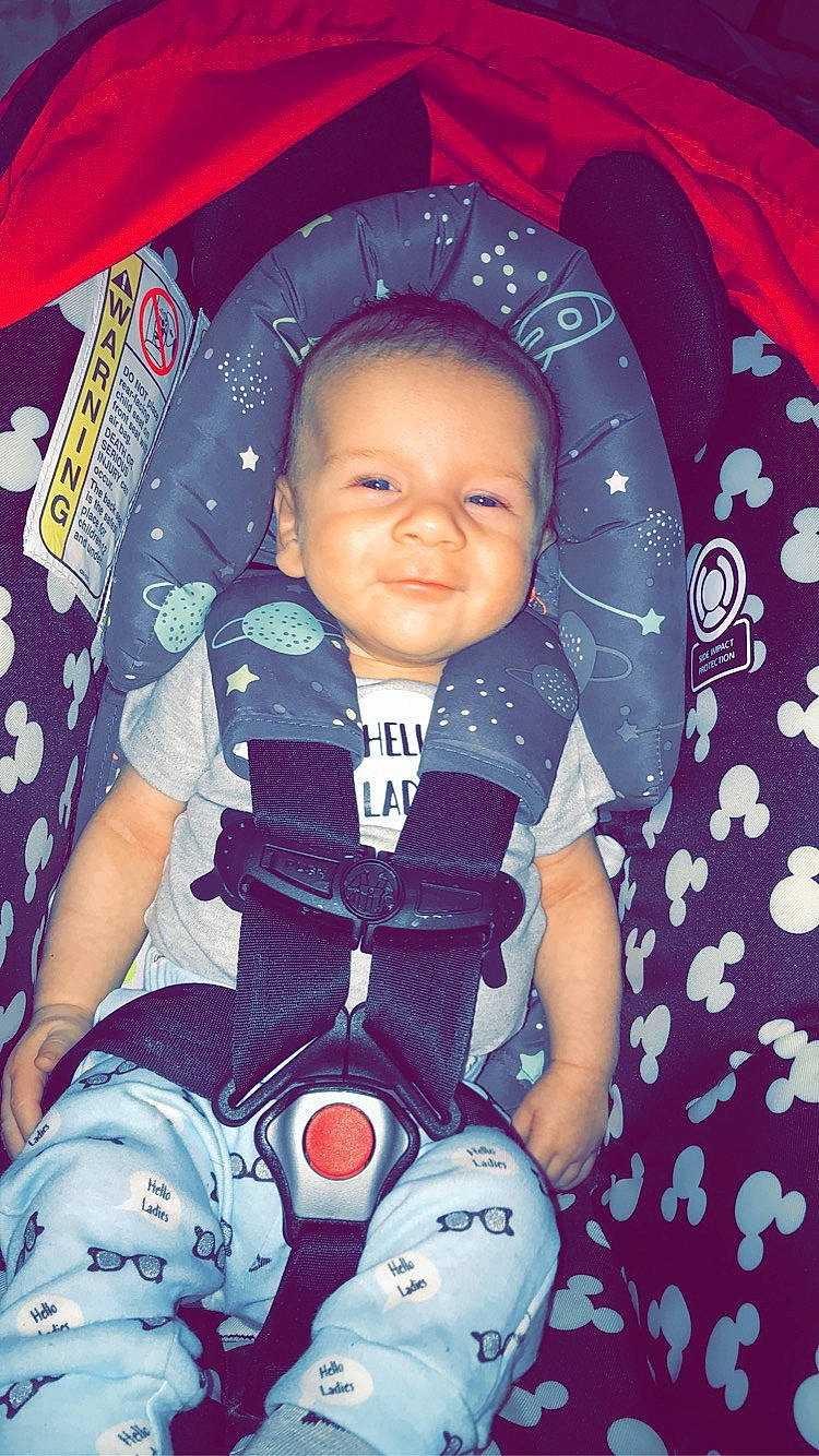 Jackson is registered to the contest to win money with this photo: baby, baby_carriage, baby_in_car_seat, baby_products, cheek, child, fun, person, product, smile, space, toddler