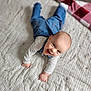 Liam joined the competition — help win amazing prizes! baby, babycrawling, babylaughing, clothing, crawling, face, happy, head, jeans, newborn, pants, person, photography, portrait, quilt, smile