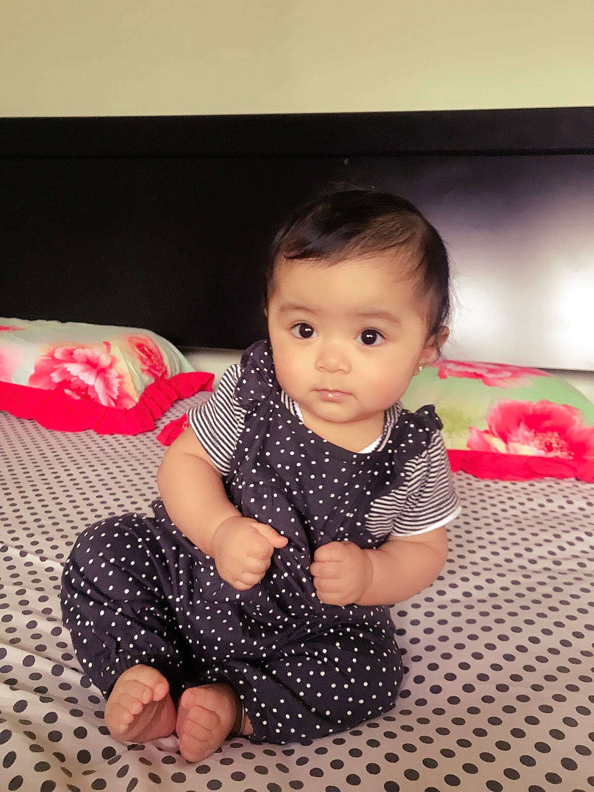 Hannah is registered to the contest to win money with this photo: baby, beauty, cheek, child, design, pattern, person, play, polka_dot, sitting, skin, smile, toddler